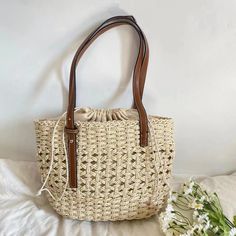 IN STOCK FAST SHIPPING FROM LOS ANGELES Back and better than ever, our woven straw market tote is perfect for carrying everything from your farmer's market bounty to a beach towel and a book. Note: Due to the natural variations in straw, color can vary slightly.Size approximately 28cm wide x 21cm tall or 11in x 8in. Designer Style ID: 8364 Country Style Straw Woven Tote Bag, Vintage Vibes, Summer Bag, Everyday Shoulder Bag, Beach Bag Casual Cream Straw Tote Bag, Casual Cream Straw Bag With Double Handle, Cream Straw Bag For Daily Use, Eco-friendly Basket Shoulder Bag For Beach Season, Natural Bucket Straw Bag With Large Capacity, Rectangular Natural Bucket Bag For Vacation, Large Capacity Natural Straw Bucket Bag, Casual Cream Straw Bag For Everyday Use, Natural Color Large Capacity Bucket Straw Bag