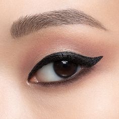 An intense matte black liquid eyeliner with a unique tapered brush that delivers instant payoff with 16-hour, smudge-resistant, waterproof wear. Waterproof Liquid Eyeliner, Black Liquid, Black Pigment, Skin Foundation, Cotton Buds, Eye Shape, Black Eyeliner, Beauty Expert, Eye Shapes