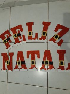 two pieces of paper cut into the shape of letters that spell out pili mata