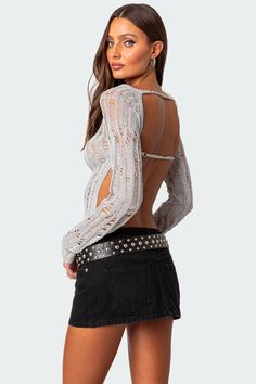 Top Long sleeves Open back Knit fabric Polyester Model wears size S Model height is 5'9 Item care: Wash with similar color Visionary Fashion, Jean Skirts, Open Back Top, Metallic Knit, Womens Sleeveless Tops, Casual Summer Tops, Swimwear Dress, Cropped Tube Top, Asymmetrical Tops