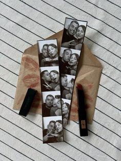 an envelope with photos and lipstick on it