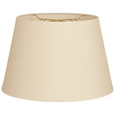 a white lamp shade with a gold chain on the bottom and an off - white background