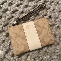 Nwt Cream + Tan Gold Accents Wristlet Branch: Coach Chic Beige Wallet With Zipper Pouch, Elegant Beige Coach Wristlet, Elegant Beige Clutch Wristlet, Elegant Beige Clutch With Wrist Strap, Elegant Beige Rectangular Wristlet, Coach Beige Pouch Wristlet, Beige Coach Pouch Wristlet, Beige Clutch With Wrist Strap For Gift, Beige Clutch With Wrist Strap As Gift