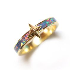 The Justice ring is a great addition to any jewelry collection. Wear alone or stack with a different color Justice ring for extra sparkle. Its simple and versatile design. Bracelet Ideas Gold, Fantasy Rings, Necklace Aesthetic, Aesthetic Rings, Cool Piercings, Engagement Earrings, Synthetic Opal, Gold Jewelry Necklace, Girl Jewelry