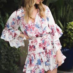 The Cecilia Dress From Misa Los Angeles Is Designed In White With Maroon And Blue Floral Print All Over Featuring A Ruffle Trim At The Neck, Hanging Self-Tie Detail, Flowy Ruffled Sleeves, Elastic Waist Band And Tiered Miniskirt. Dress Is Xs But Will Definitely Fit An S As Well. White Floral Print Dress, Dots Dress, Metallic Mini Dresses, Chiffon Mini Dress, Striped Mini Dress, Ruffle Mini Dress, Blue Floral Print, Ruffled Sleeves, Bell Sleeve Dress