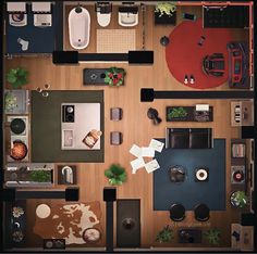 an overhead view of a living room with furniture and decor on the floor, from above