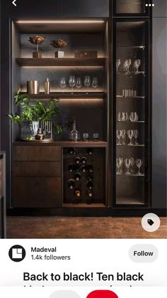 an open cabinet with wine glasses in it and the text back to black ten black