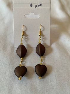 dark brown and gold dangle earrings Cheap Traditional Brown Jewelry, Cheap Brown Jewelry With Dangling Beads, Elegant Brown Metal Jewelry, Handmade Brown Dangle Jewelry, Brown Dangle Metal Earrings, Brown Metal Dangle Earrings, Brown Pierced Metal Earrings, Elegant Brown Beaded Earrings, Adjustable Brown Drop Earrings