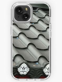 an iphone case with the image of roof tiles in black and white, on a clear background