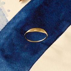 The Tiny Signet Ring is the pinnacle of minimalist design and elegant rings. Its plainness with glamorous modesty will fascinate people around you. It is perfect for everyday use and ring stacking. - Made in 14k Solid Gold - Band Width: 1.26 mm / 0.04 inches- Top Width: 3.30 mm / 0.12 inches- Thickness: 1.06 mm / 0.04 Modern Signet Ring With Round Band, Minimalist Signet Ring With Polished Finish, Modern Stackable Signet Ring For Formal Events, Modern Stackable Rings With Smooth Bezel For Formal Occasions, Elegant Stackable Signet Ring In Recycled Gold, Modern Yellow Gold Stackable Rings With Round Band, Modern Signet Ring With Round Band For Promise, Stackable Yellow Gold Signet Ring For Everyday, Modern Signet Ring As Promise Ring