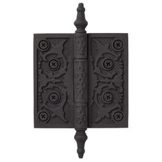 an iron door hinge with decorative designs on the front and back side, in black