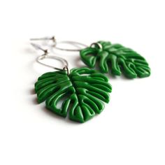 Monstera Leaf Earrings.The size of a leaf is about 1.4 inches (3,5 cm),Length of earrings is about 2.5 inches (5,5 cm).Materials: polymer clay, stainless steel earrings.Other earrings you can see here: https://www.etsy.com/shop/RinaStudioDesign?section_id=24005662• Submersion in water is not recommended for polymer clay as this will quickly deteriorate the product. It is recommended that you remove the earrings prior to swimming or showering to extend the life of the product.• Due to the handmad Minimalist Leaf-shaped Jewelry With Matching Earrings, Minimalist Leaf-shaped Ear Wire Jewelry, Handmade Leaf-shaped Earrings, Leaf-shaped Jewelry Gift, Trendy Leaf-shaped Jewelry Gift, Hypoallergenic Leaf-shaped Nature-inspired Jewelry, Nature-inspired Hypoallergenic Leaf Earrings, Nickel-free Leaf-shaped Nature-inspired Earrings, Green Dangle Hoop Earrings