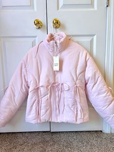 Somewhere on the my mom made it Pink Puffy Coat, Pink Puffer Winter Coat, My Mum Made It Puffer Jacket, Pink Aesthetic Winter Outfit, Coquette Puffer Jacket, Pink Puffer Jacket Outfit Winter, Winter Jackets 2024, Pink Puffer Vest Outfit, Pink Winter Outfits