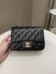 Chanel Classic Quilted Mini SquareBlack Caviar24K Gold Plated HardwareSize 17 x 13 x 7 cmChain drop 53 cm11 Series9.5/10 Excellent (inevitable scratches on hardware, minimal signs of use, overall excellent)Includes dust bag and ity cardPrice now 8990 sgd 6630 usd CN5612-02 Chanel Mini Bag, Gold Ounce, North Korean, Black Caviar, Chanel Bag, Bottega Veneta, Chanel Classic, Luxury Bags, Dust Bag