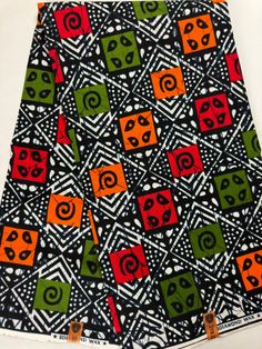 "Material: 100% cotton Top QUALITY FABRIC Print: DOUBLE-sided  Width: 46\" This timeless appeal & adorable African print is perfect for making African Clothing, African Quilts, Upholstery, Home Décor, and unique accessories. FABRIC CUT:        Purchase of 1+ yards per customer will be cut as 1 continuous  piece of fabric up to a maximum length of 6 yard. LABELS: All African fabric is sold with an adhesive Manufacturer label attached. Create your unique one of a kind piece. Get it today.  Each pi Multicolor Cotton Fabric For Festivals, Traditional Patterned Cotton Fabric For Festivals, Traditional Cotton Batik Print Digital Prints, Patterned Block Print Cotton Fabric, Traditional White Cotton Digital Prints, Fitted Black Cotton Fabric, Traditional Multicolor Cotton Fabric With Batik Print, Multicolor Cotton Fabric With Printed Motifs, Cotton Batik Print Fabric