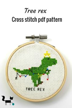 a cross stitch pattern with a pink flower cactus in a pot on it's side