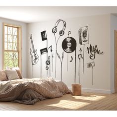 a bed sitting under a window next to a wall with musical notes on it and headphones