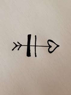 an arrow is drawn on the side of a piece of paper