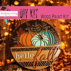 a wooden sign that says diy kit with pumpkins and gourds on it