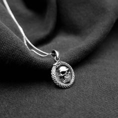 "Real 925 Sterling Silver Ouroboros Snake Skull Charm Necklace This simple yet elegant necklace features a sterling silver Ouroboros Snake Skull on a Dainty Sterling silver 18\" cable chain. Charm Measures 28 x 17.5mm Jewelry will come in a gift box * Please read shop policy before placing an order * *JEWELRY CARE* Sterling Silver will tarnish over time, but to help keep your jewelry looking beautiful - Clean with a soft dry cloth after wear and store inside an airtight bag or container. Remembe Witchy Necklace, Snake Skull, Ouroboros Snake, Talisman Jewelry, Celtic Necklace, Snake Jewelry, Snake Necklace, Skull Necklace, Snake Ring