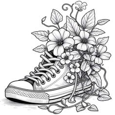 a pair of sneakers with flowers on the side and leaves around them, in black and white