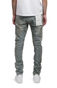 Ripped knees and raw hems lend laid-back style to these skinny jeans enhanced with a bit of stretch to move with you. 13" leg opening; 11" front rise; 14 1/2" back rise 98% cotton, 2% Lycra® spandex Machine wash, line dry Imported Asian Owned/Founded Urban Fitted Jeans With Frayed Hem, Streetwear Fitted Jeans With Frayed Hem, Fitted Jeans With Frayed Hem For Streetwear, Stretch Washed Jeans For Streetwear, Purple Brand Jeans Outfit Men, Urban Fitted Jeans With Zipper Closure, Stretch Jeans With Zip Fly For Streetwear, Fitted Urban Jeans With Zipper Closure, Purple Jeans Outfit Men