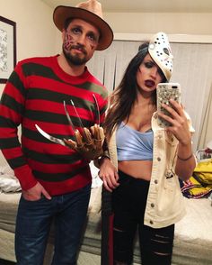 a man and woman dressed up in costumes