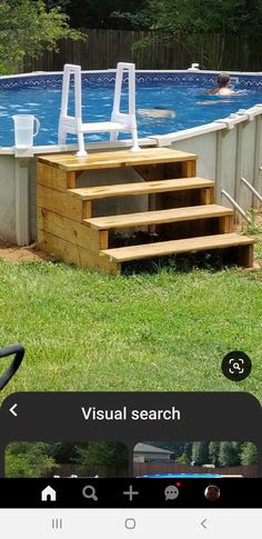 an above ground swimming pool with steps leading up to it and a ladder in the foreground