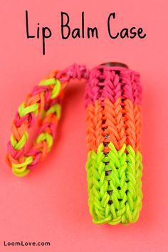 a close up of a colorful bracelet on a pink background with the words lip balm case