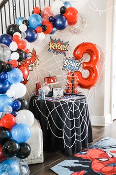 a birthday party with balloons and decorations