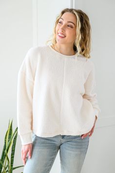 Those chilly days aren't going anywhere anytime soon so make sure to stay cozy in the Fuzzy Cuddles Sweater In Off White! This extra cuddly sweater is shaped from a fuzzy knit, making up a round neckline with drop shoulder long sleeves and a slightly cropped, boxy bodice. Stretchy + Medium Weight Self: 100% Polyester Contrast: 95% Polyester, 5% Spandex Wash cold, hang dry Relaxed fit *Measurements listed below are of the actual clothing item* S: Chest 34" Length 23"M: Chest 36" Length 24"L: Ches Tara Lynn, Boutique Trends, Types Of Women, Destroyed Jeans, Stay Cozy, White Sweaters, Kids Jacket, S Models, Drop Shoulder