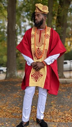 Olaniyi Red and Gold African Aso Oke Grand bobou Robe - DPAGRG22 Inner Dashiki Top and Pants sold separately Beaded Necklace and bracelet sold separately Cufflinks not included, sold separately Unique embroidery Handwoven, Silk and Cotton Blend Dry clean only Red Festive Kaftan With Traditional Patterns, Red Traditional Kaftan For Festivals, Red Ceremonial Kaftan For Festivals, Ceremonial Embroidered Red Kaftan, Beaded Necklace And Bracelet, Dashiki Shirt, African Print Tops, Aso Oke, Unique Embroidery