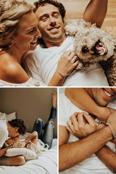 a man and woman laying in bed cuddling with a dog while holding their hands up to each other