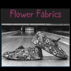 two slippers sitting on top of a bowling ball court with the words flower fabrics