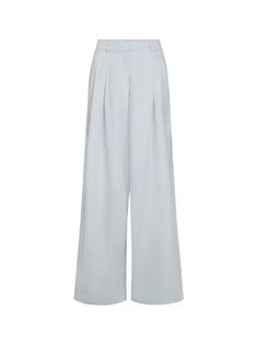 The TWP Didi Pant features a mid-rise, wide leg silhouette with a light blue linen finish. The pants are detailed with pressed pleats, side pockets and a zip fly closure. [tab] Composition: 77% viscose, 23% linen. Size and Fit: Runs True to Size Care Instructions: Dry Clean Only Origin: Imported SKU: TWP50P44A-LB Questions about size, fit, or how to style? The KZ team is here to help you look and feel your best! Chat with our stylists via the icon below. Trendy Light Blue Mid-rise Pants, Fitted Light Blue Wide Leg Pants, Light Blue Wide-leg Pants With Pockets, Light Blue Cotton Wide-leg Pants, Luxury Washed Blue Wide-leg Pants, Dinner Jacket, Grey Pants, Pleated Pants, Crop Shirt