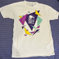 Taco Bell T- Shirt With Colorful Logo Pattern Taco Bell Shirt, Bell Top, Colorful Logo, Taco Bell, Logo Pattern, Diy Canvas Art, Diy Canvas, Logo Color, Color Purple