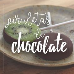 chocolate covered kiwi on a plate with the words pistaas de chocolate