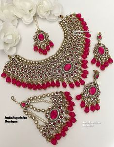 Premium Quality Pakistani bridal set/Pakistani Jewelry/ Indian and Pakistani wedding jewelry/ Bollywood jewelry/ kundan and Polki jewelry/Reception jewelry  This elegant necklace set comes with earrings, tikka and Jhoomer/Passa/ hot pink magenta color  All items are shipped from Brampton, Ontario, Canada. If you need your item by a certain day, please reach out to us for express delivery option before placing the order. We kindly request to consider minor variations in colors, shades, textures as pictures displayed may slightly vary from the actual product due to digital image limitations.Please expect the possibility of some minor imperfections when buying handmade jewelry. Please contact us for any questions you might have. Thank you and Happy shopping 😊 Bollywood Style Pink Bridal Sets For Wedding, Heavy Pink Bridal Necklace For Wedding, Pink Chandbali Kundan Necklace For Wedding, Heavy Pink Kundan Necklace For Wedding, Pink Bollywood Bridal Set With Stone Work, Traditional Pink Bridal Sets With Stone Work, Heavy Pink Kundan Bridal Necklace, Pink Kundan Bridal Sets For Festivals, Heavy Pink Chandbali Bridal Necklace