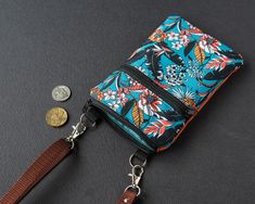 Travel wallet for mobile phone, shoulder bag, small passport bag over the shoulder. Indian patterns See this item in a different fabric: https://www.etsy.com/shop/BEBOKI?ref=seller-platform-mcnav&section_id=36642075 FUNCTIONS: - Appendix. external dimensions 7 "by 4.7". (12x18 cm) - Fits devices up to 6.3 "x 3.4" - in its manufacture, a designer waterproof fabric was used. - on a navy cotton lining. - filled with foam to protect your device from accidental bumps and drops - Black nylon zip and d Versatile Phone Bag With Zipper For Daily Use, Rectangular Phone Bag With Zipper Pouch For Travel, Rectangular Zipper Pouch Phone Bag For Travel, Travel Crossbody Phone Bag With Zipper, Multicolor Phone Bag With Cell Phone Pocket For Travel, Multicolor Shoulder Bag With Card Slots For Travel, Multicolor Rectangular Phone Bag For Travel, Neck Pouch, Indian Patterns