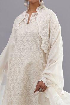 Buy Off White Kurta And Dupatta Floral & Sequins Straight Pant Set For Women by KORA Online at Aza Fashions. Elegant Salwar Kameez With Cutdana For Eid, Elegant Straight Kurta Set With Cutdana, Elegant Unstitched Anarkali Set For Traditional Ceremonies, Elegant Cutdana Salwar Kameez For Eid, Elegant Straight Kurta Palazzo Set With Cutdana, Off White Designer Wear Sets For Transitional Season, Off White Designer Sets For Transitional Season, White Unstitched Straight Kurta Suit For Festive Occasions, Elegant Unstitched Salwar Kameez For Traditional Ceremonies