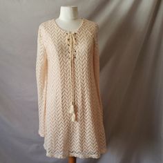 Cream Dress Bell Sleeves Size L Long Sleeve Lace Dress For Vacation, Long Sleeve Lace Vacation Dress, Long Sleeve Crochet Dress For Spring Brunch, Casual Long Sleeve Crochet Dress For Brunch, Beige Bell Sleeve Dress, Casual Long Sleeve Beige Crochet Dress, Spring Fitted Mini Dress With Bell Sleeves, Knit Bell Sleeve, White Short Lace Dress Bell Sleeves