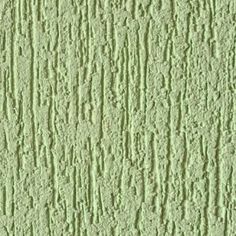 a green textured wall with some lines on it