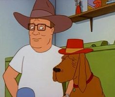 a man in a hat and glasses sitting next to a dog