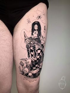 a man with a tattoo on his thigh