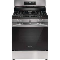 a stainless steel stove and oven with the top burner on an isolated white background