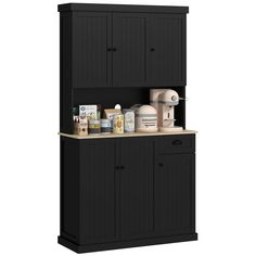 a black cabinet with two doors and shelves on the top, one door open to reveal an assortment of items