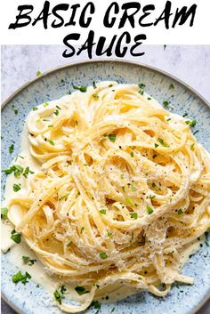 pasta with parmesan cheese and chives on a blue plate text reads basic cream sauce