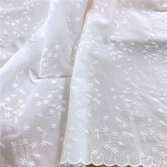 "Very popular with clothing and home furnishings, we have a whole range of beautiful eyelet fabric for sale that is great for handmaking dresses, tops, skirts, lightweight curtains, bedding, table coverings, throw pillows, craft projects and whatever else your... This listing is for ONE yard.  If you buy more, you will get a uncut piece . Width approx: 53.1\" (135 cm) More Cotton Fabric:  https://www.etsy.com/shop/lacelindsay?ref=seller-platform-mcnav&section_id=27499407 For more quantity, pleas Sunflower Clothing, Soft Summer Fashion, Stylish Pants Women, Tablecloth Curtains, Fabric Shops Online, Banquet Dresses, White Eyelet Dress, Eyelet Fabric, Party Kleidung