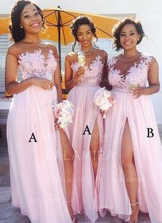 three beautiful women standing next to each other in pink dresses and holding an umbrella over their heads