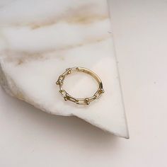 Look no further for the perfect stacker: Our Small Tiffany Link ring is dainty and beautiful, with just the right amount of texture to give it an exciting edge! Not only is it a chic accessory, but it's also looks great paired with our other stacking bands. Materials: 10K Yellow Gold Measurements: Sizes 4-8 Half sizes available! Link Ring, Stacking Bands, Linking Rings, Chic Accessories, Steel Jewelry, Stainless Steel Jewelry, Jewelry Plate, My Jewellery, Gold Jewelry